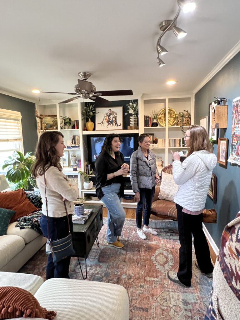 visitors in a home that was featured in the art tour of homes