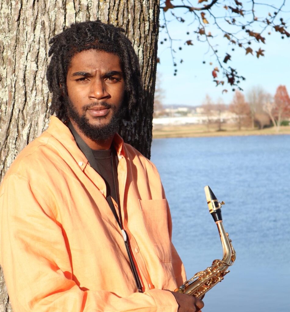 WD Flow Entertainment holding his saxaphone