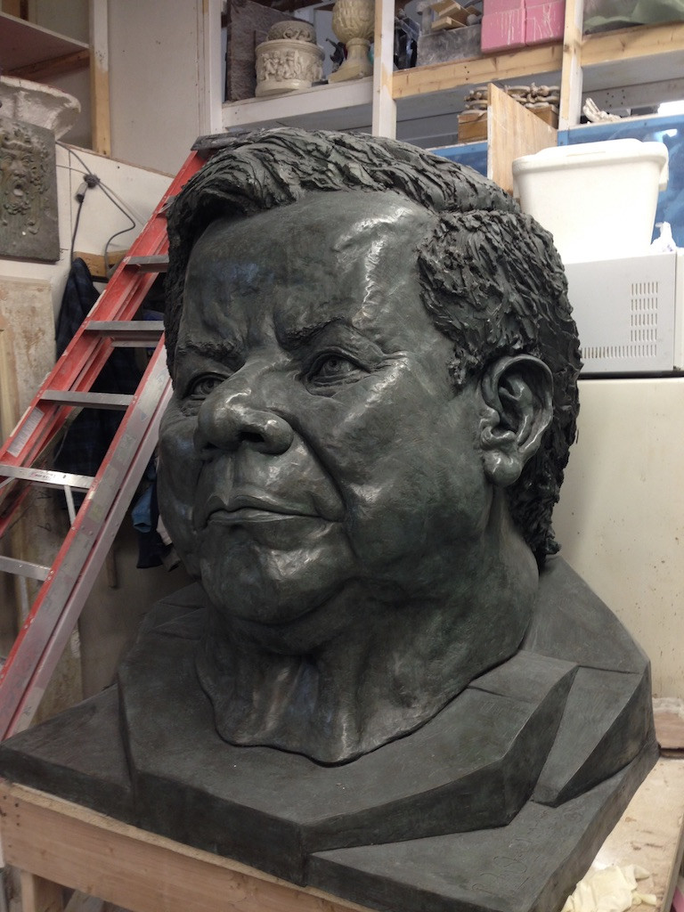 Bronze bust of a man.