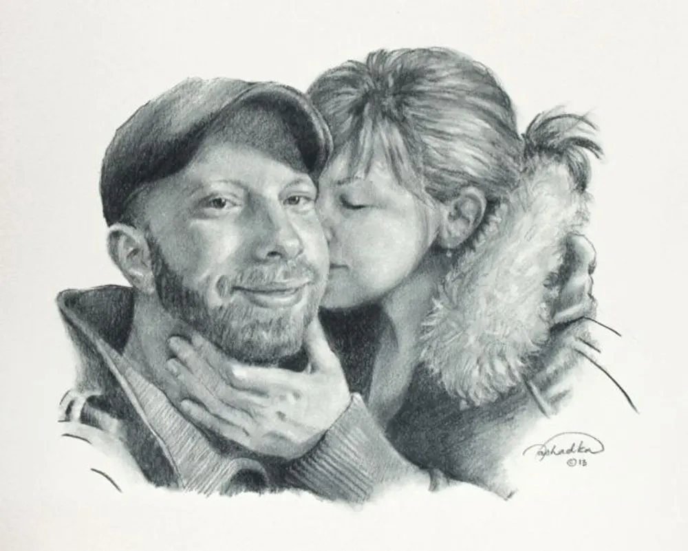 A drawing of a girl kissing a man on the cheek.